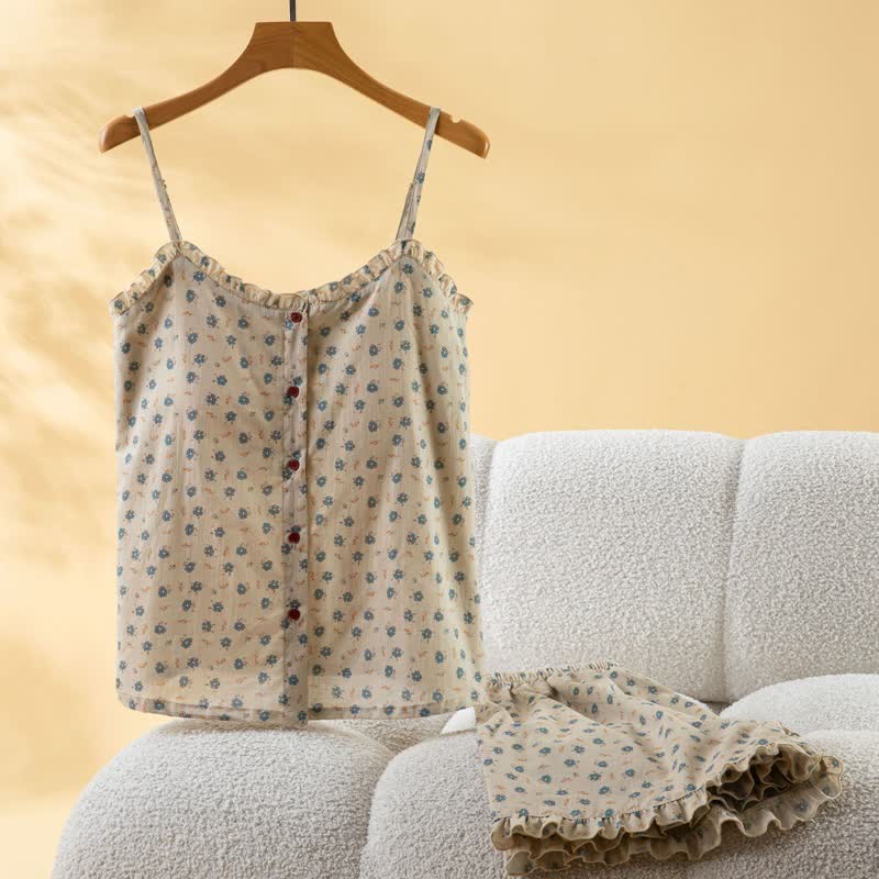 Pigiama da donna in cotone blu con volant e stampa floreale. - image 1