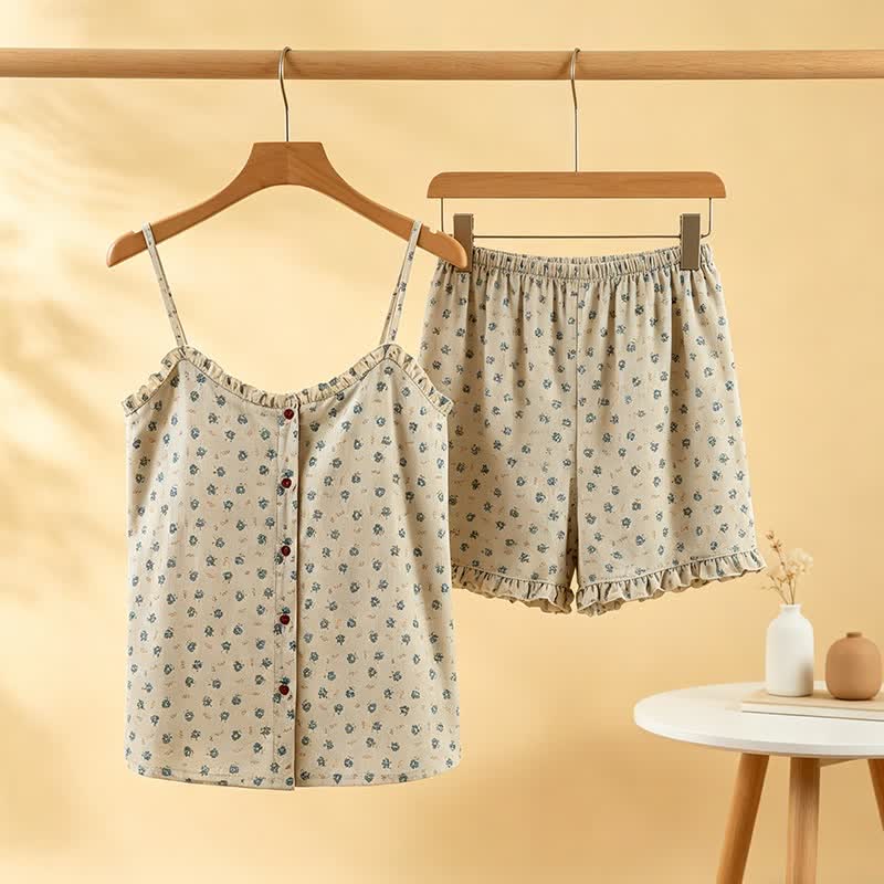 Pigiama da donna in cotone blu con volant e stampa floreale. - image 0