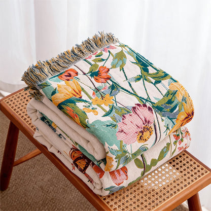Trapunta reversibile in garza con frange e motivo floreale ad acquerello - image 2