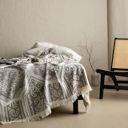 Coperta in cotone con motivo paisley damascato - image 2