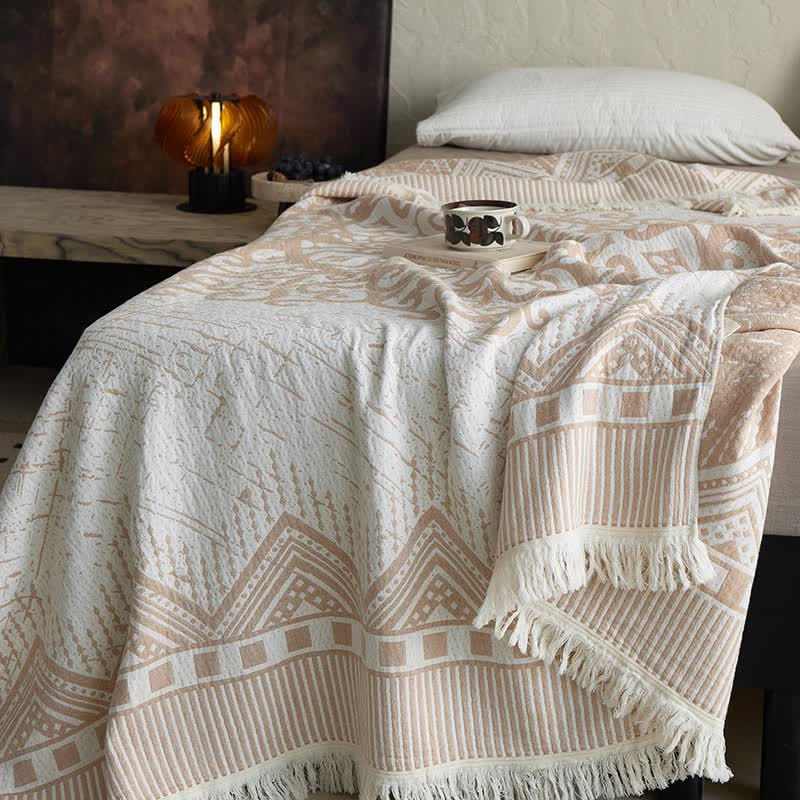 Coperta tribale in garza di cotone con nappe e motivi geometrici - image 6