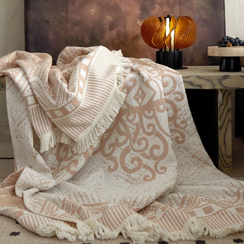 Coperta tribale in garza di cotone con nappe e motivi geometrici - image 1