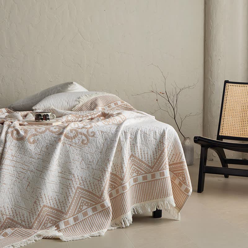 Coperta tribale in garza di cotone con nappe e motivi geometrici - image 2
