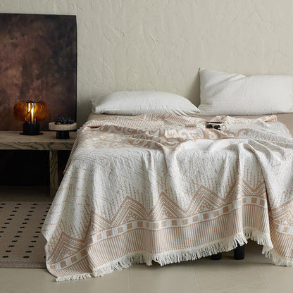 Coperta tribale in garza di cotone con nappe e motivi geometrici - image 3