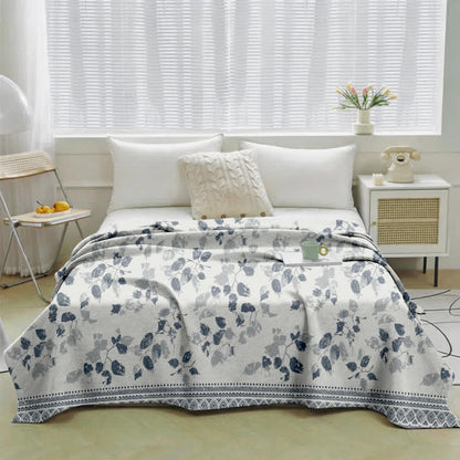 Trapunta in garza di cotone con stampa a foglie in stile boho - image 1