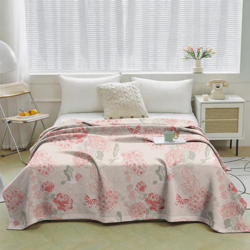 Trapunta jacquard color rosa pastello con ortensie - image 1