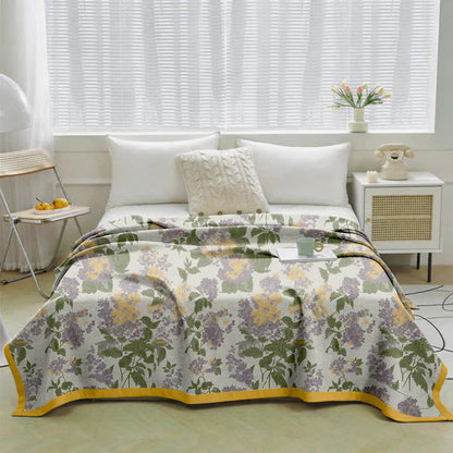 Trapunta in garza jacquard con motivo floreale lilla e senape - image 1