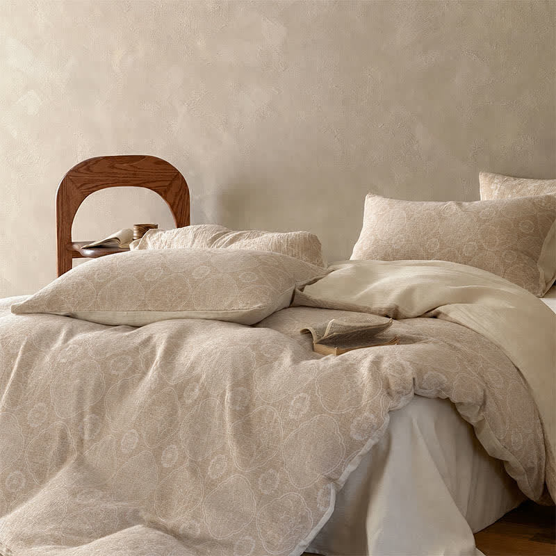 Set di biancheria da letto in cotone jacquard con motivo geometrico floreale color cammello. - image 2