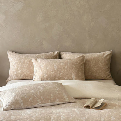 Set di biancheria da letto in cotone jacquard con delicato motivo floreale color cammello. - image 2