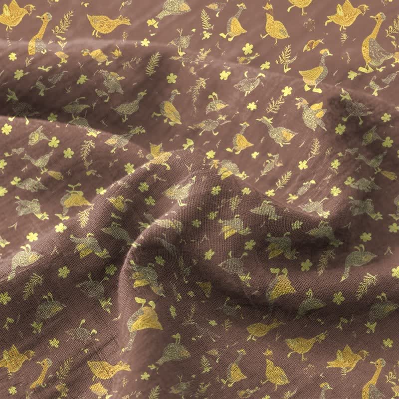 Copriletto in doppia garza di cotone con stampa floreale e motivo a papera. - image 2