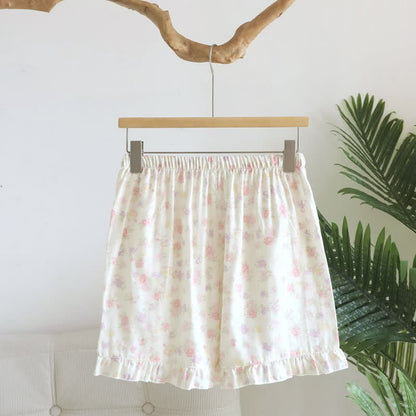 Pantaloncini da pigiama in cotone con volant e stampa floreale - image 1