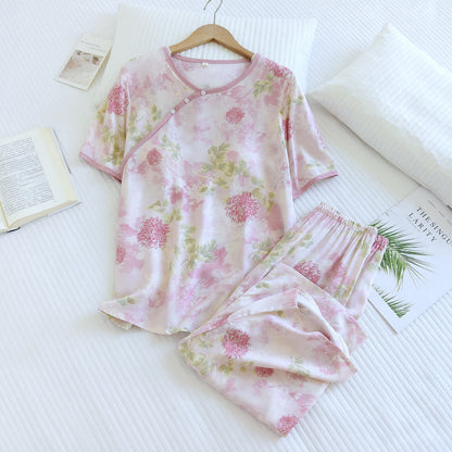 Pigiama composto da pantaloni corti imbottiti con stampa floreale di ortensie. - image 1