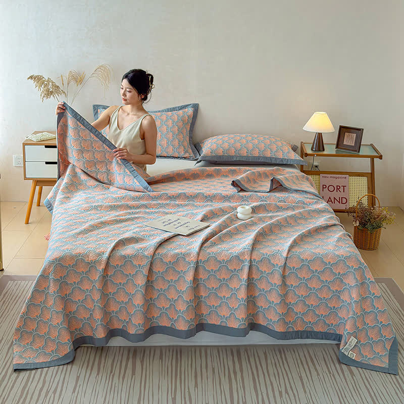 Trapunta a 3 strati in mussola di cotone jacquard con motivo a conchiglie marine - image 1