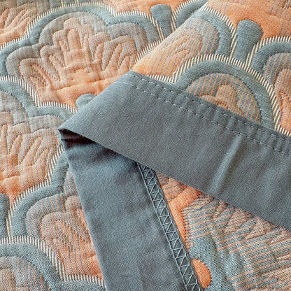 Trapunta a 3 strati in mussola di cotone jacquard con motivo a conchiglie marine - image 11