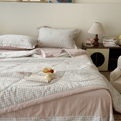 Set di biancheria da letto in cotone lavato con fantasia a quadri pastello. - image 1