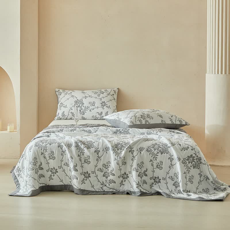Set di trapunte reversibili con motivo rami e fiori - image 1