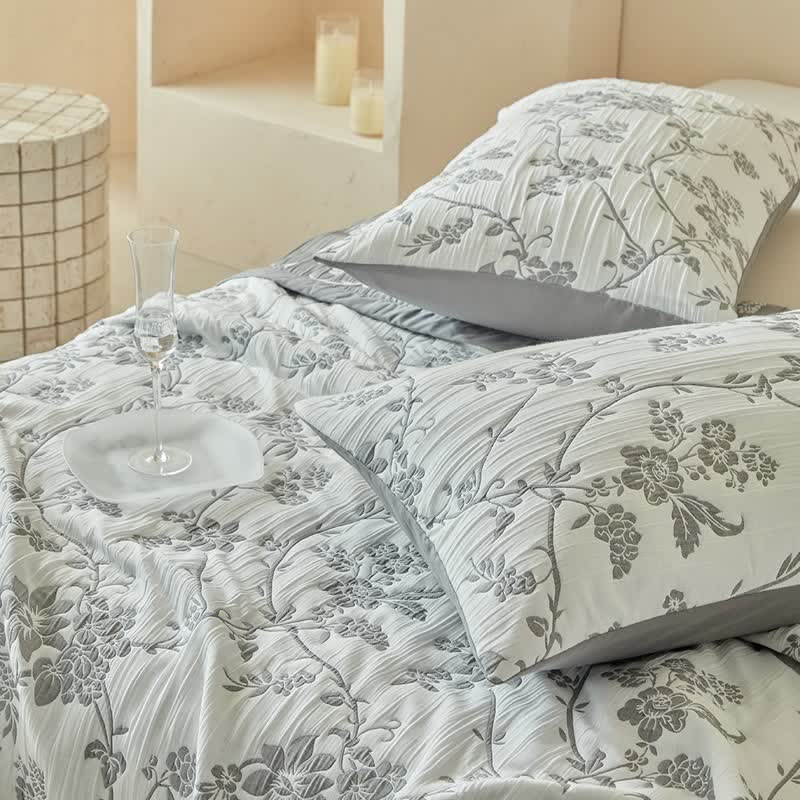 Set di trapunte reversibili con motivo rami e fiori - image 13