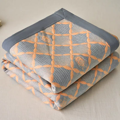 Trapunta reversibile in garza di cotone jacquard con motivo a reticolo - image 1
