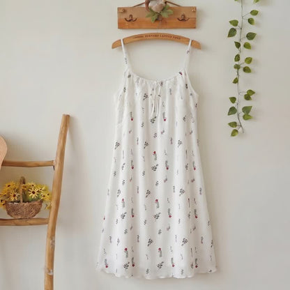 Abito sottoveste bianco senza maniche con stampa floreale, perfetto per il relax. - Bianco - L - image 0