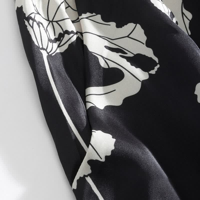 Completo pigiama nero con canotta e pantaloncini a fantasia floreale - image 10