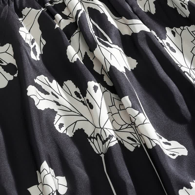 Completo pigiama nero con canotta e pantaloncini a fantasia floreale - image 11