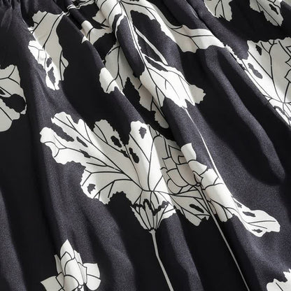 Completo pigiama nero con canotta e pantaloncini a fantasia floreale - image 11