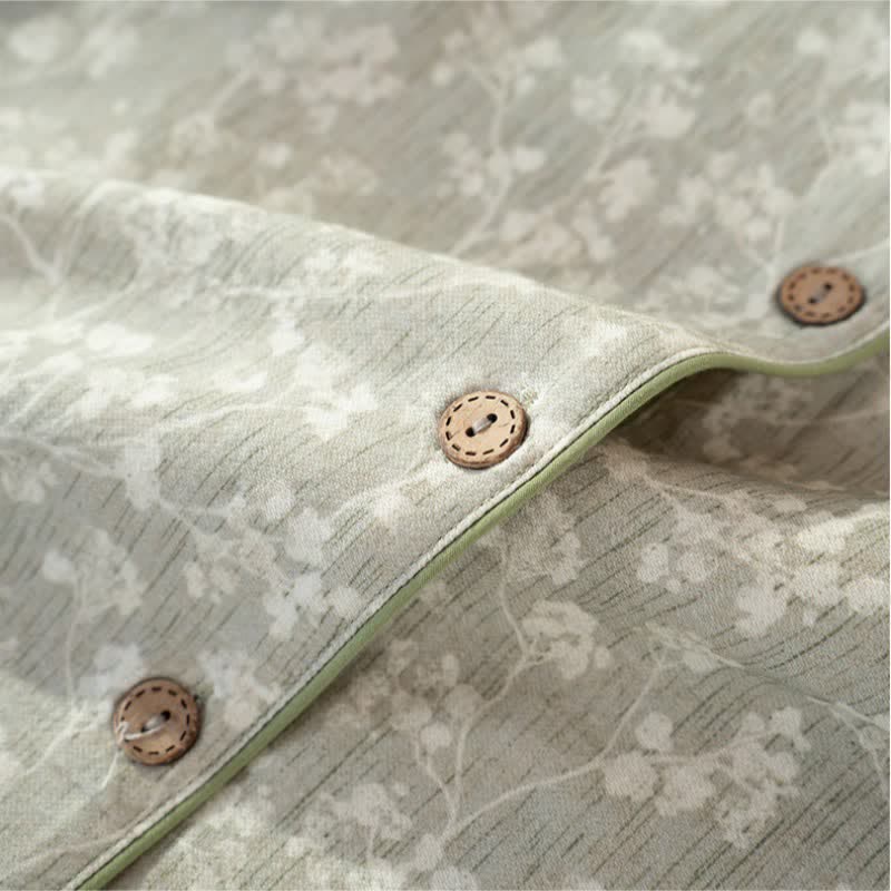 Pigiama in morbido cotone con stampa floreale e bottoni sul davanti. - image 7
