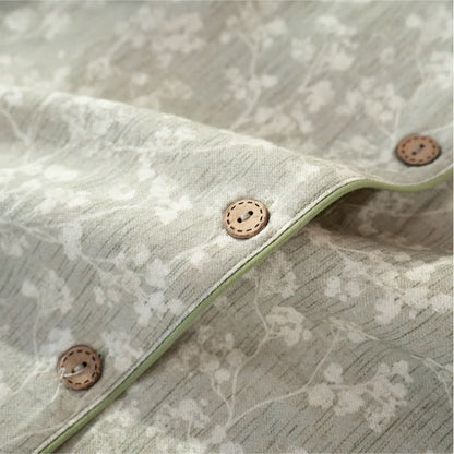 Pigiama in morbido cotone con stampa floreale e bottoni sul davanti. - image 7