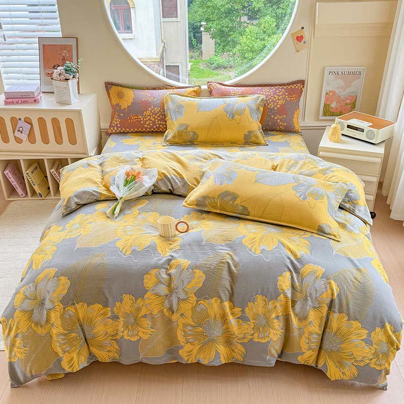 Set di biancheria da letto in garza di cotone con motivo floreale, composto da 4 pezzi. - image 1