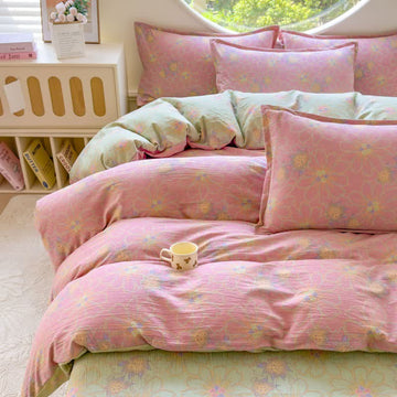 Set di 4 pezzi di biancheria da letto in doppia garza di cotone con stampa floreale pastello. - Matrimoniale Grande - image 0