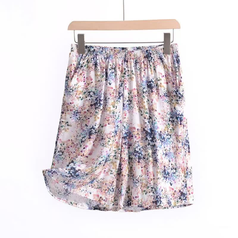 Pantaloncini da casa estivi in ​​cotone con stampa floreale e vita arricciata. - image 4