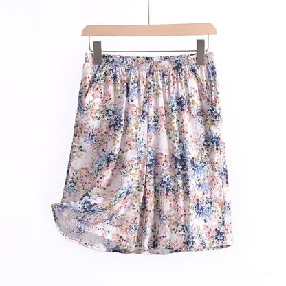 Pantaloncini da casa estivi in ​​cotone con stampa floreale e vita arricciata. - image 4
