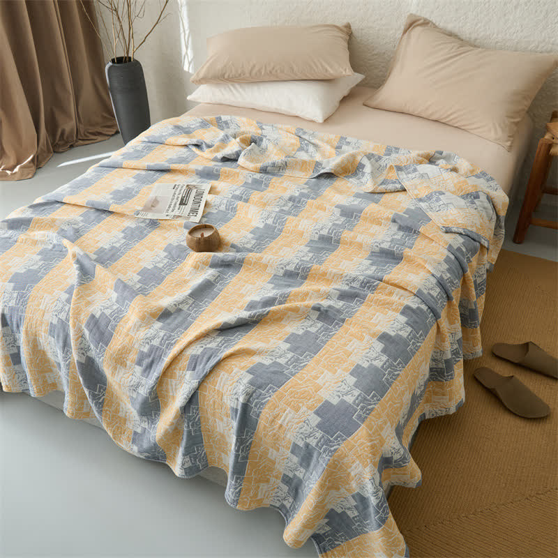 Coperta reversibile in mussola di cotone con motivi geometrici - image 1