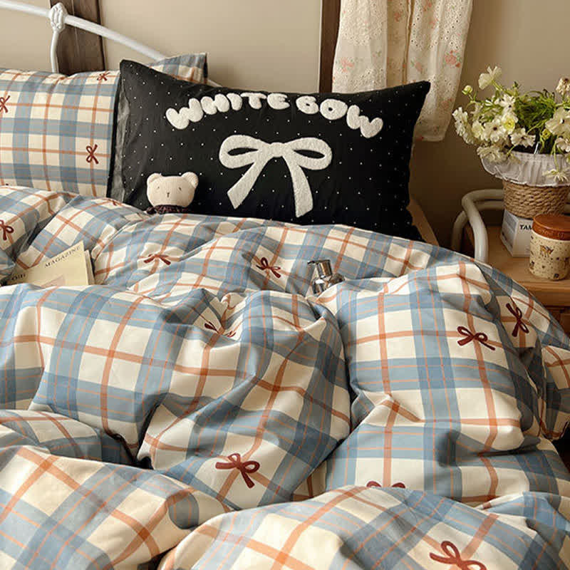 Set di biancheria da letto in morbido cotone lavato con motivo a fiocchi e quadri. - image 1