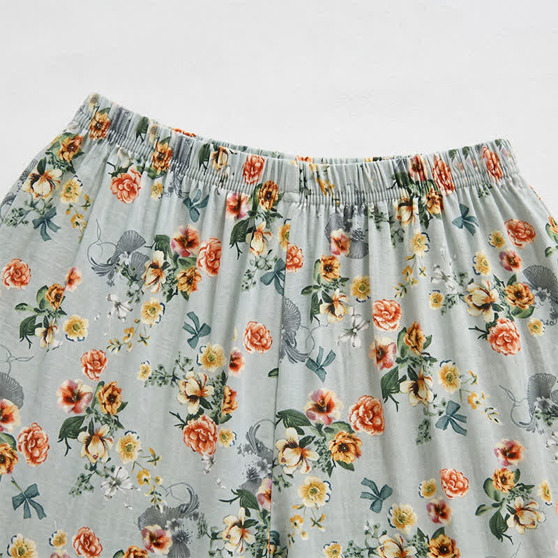 Pantaloncini estivi da relax con orlo a balze e stampa floreale vintage. - image 1