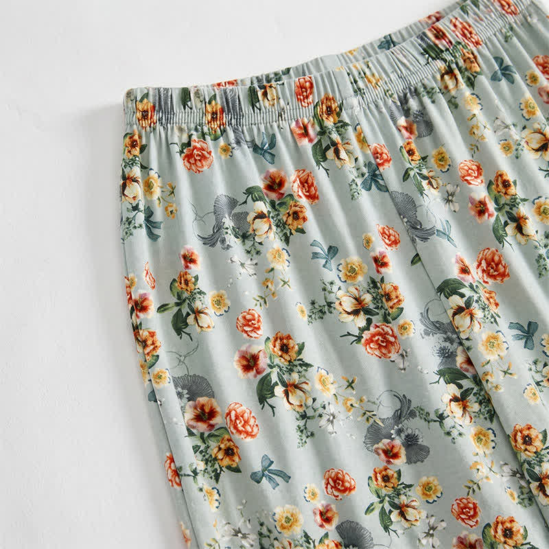Pantaloncini estivi da relax con orlo a balze e stampa floreale vintage. - image 2