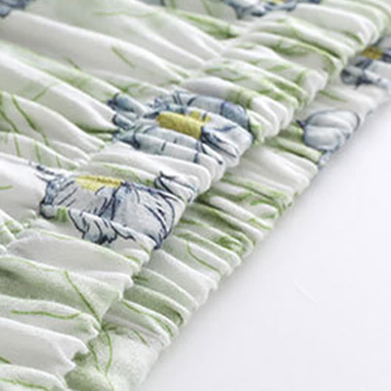 Completo da casa in raso con stampa floreale color menta, pantaloncini e bottoni - image 5