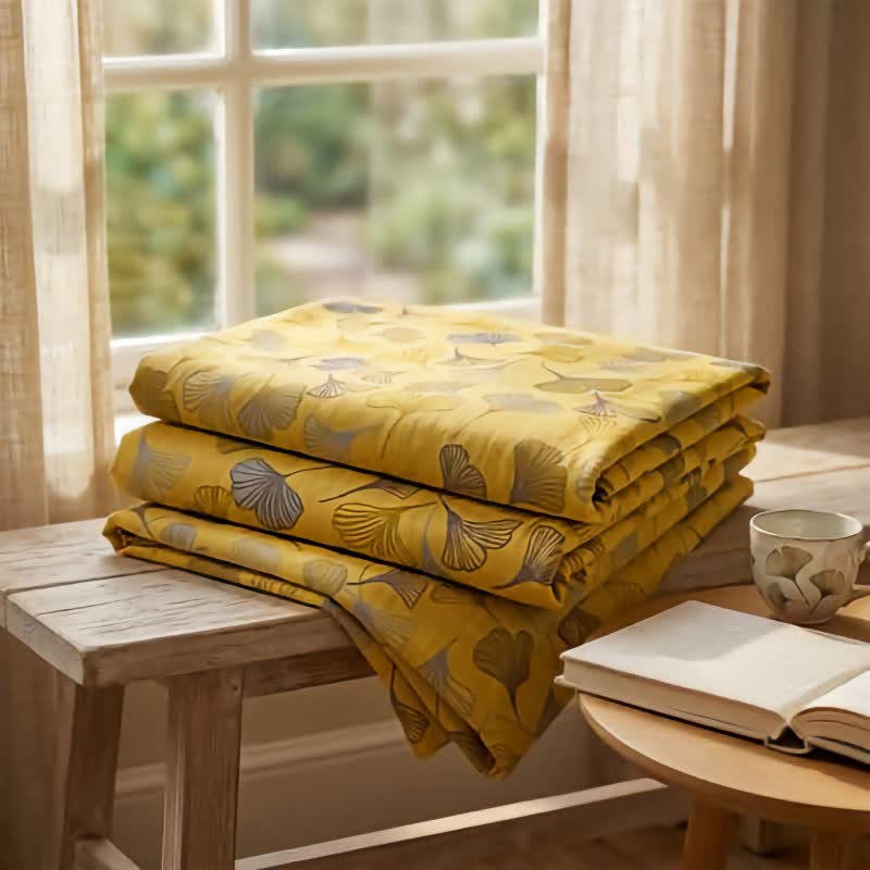 Coperta trapuntata in cotone color senape e ginkgo - image 1