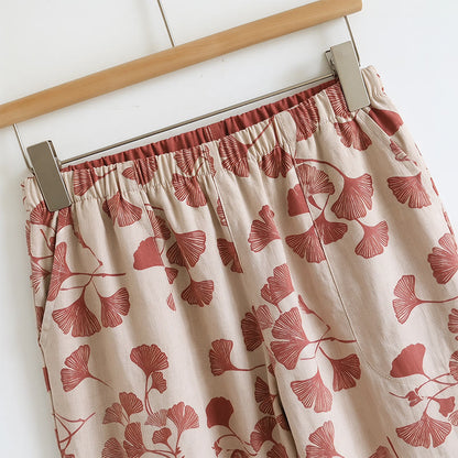 Completo da casa composto da canotta e pantaloni con motivo a foglie botaniche. - image 11