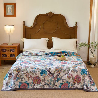 Trapunta reversibile vintage in mussola di cotone con motivi botanici - image 0