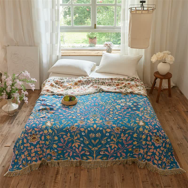 Trapunta reversibile in mussola di cotone a fantasia floreale con nappe - image 3