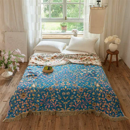 Trapunta reversibile in mussola di cotone a fantasia floreale con nappe - image 3