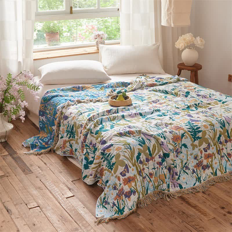 Coperta trapuntata reversibile in mussola con nappe botaniche - image 3