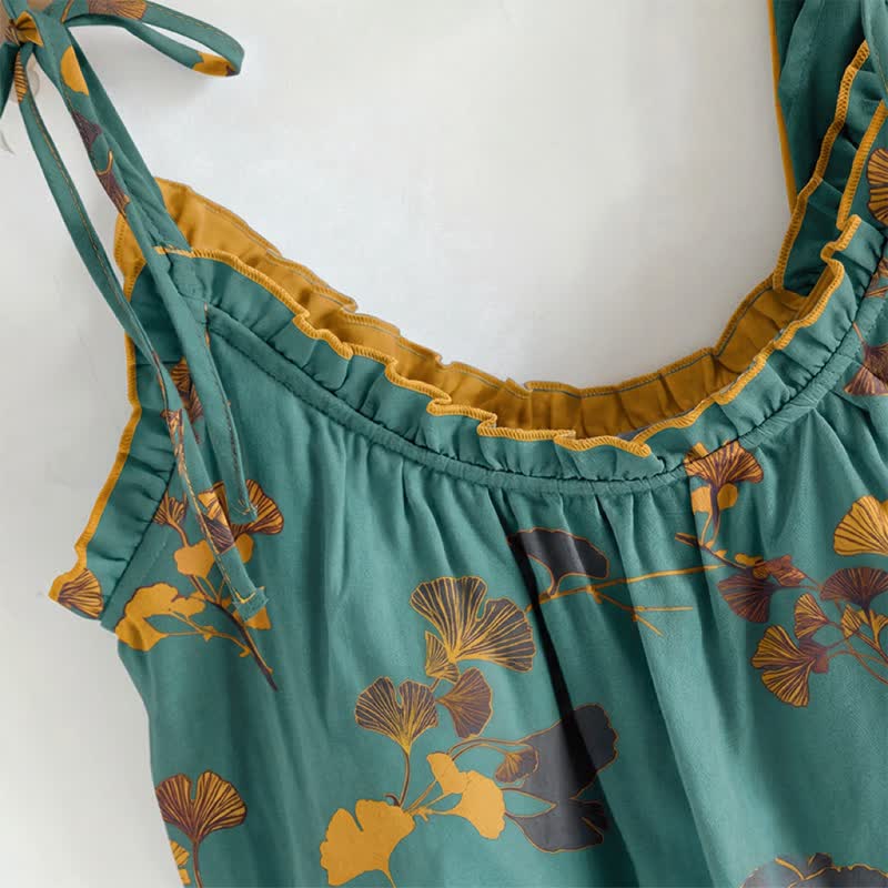 Completo da casa composto da canotta e pantaloni con motivo a foglie botaniche. - image 1