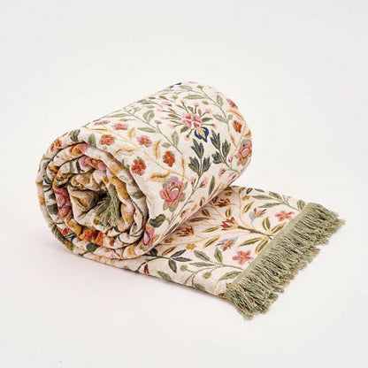 Trapunta reversibile in mussola di cotone a fantasia floreale con nappe - image 0