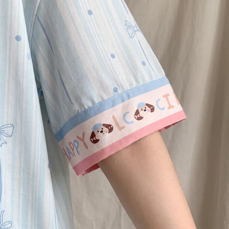 Set pigiama azzurro con stampa di cuccioli - image 4