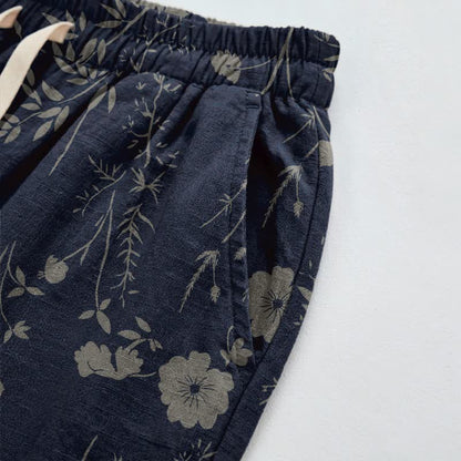 Pantaloni da casa in cotone a trama grossa color blu navy con fiori selvatici - image 3