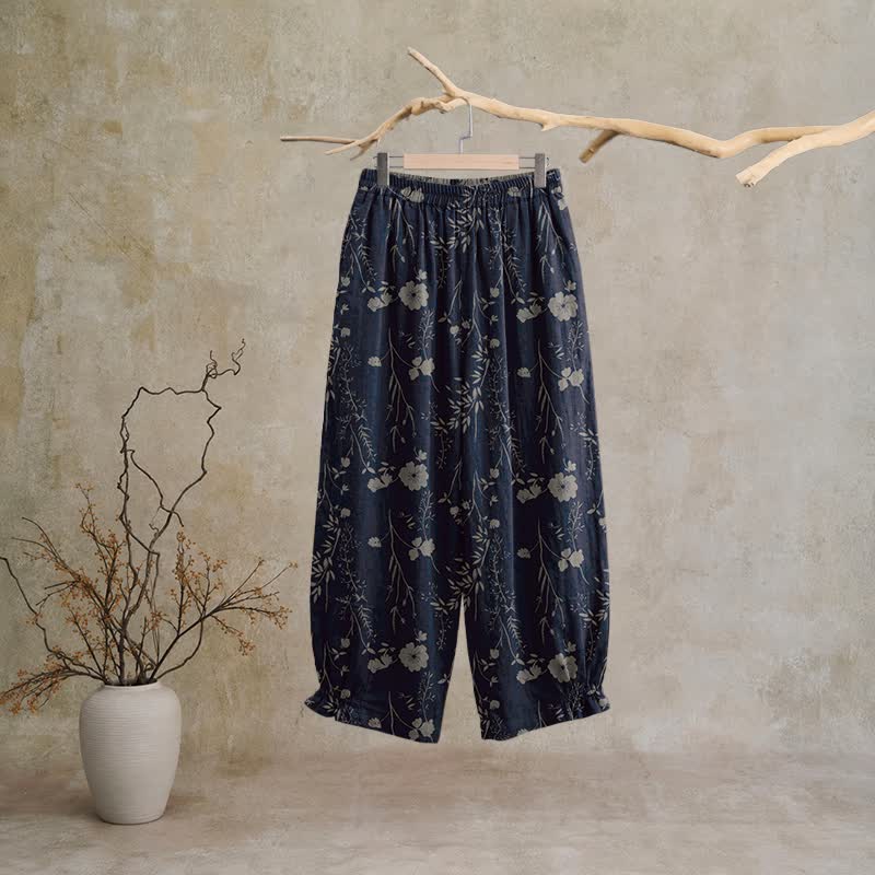Pantaloni da casa in cotone a trama grossa color blu navy con fiori selvatici - image 1
