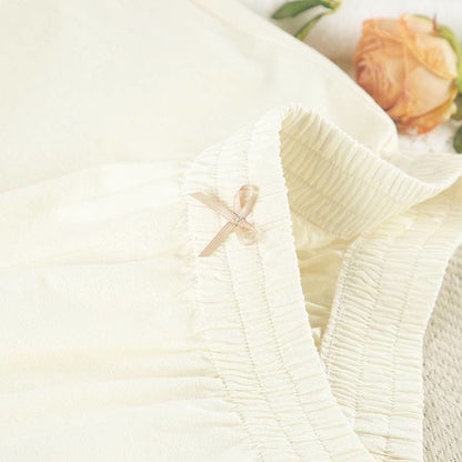 Elegante completo da casa in cotone con orlo a balze. - image 9