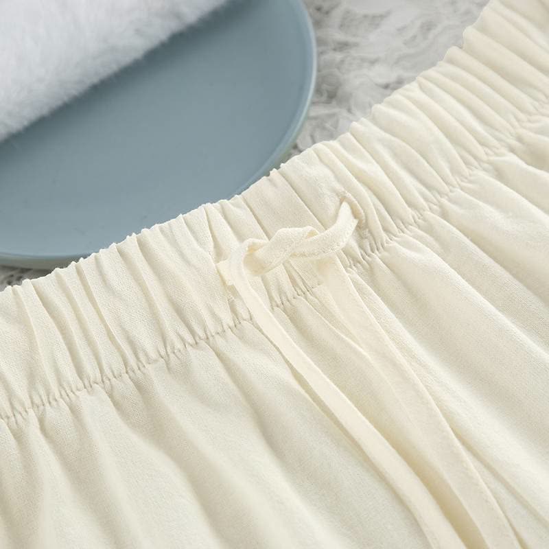 Set pigiama minimalista in cotone a maniche lunghe con tasche. - image 10